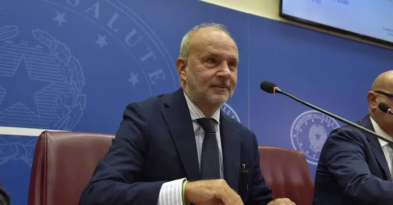Orazio Schillaci seated at a press table in the Ministry of Health press room